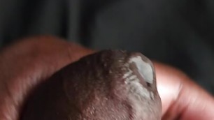 grabbing and rubbing on black african pulsating cock close up pre cum