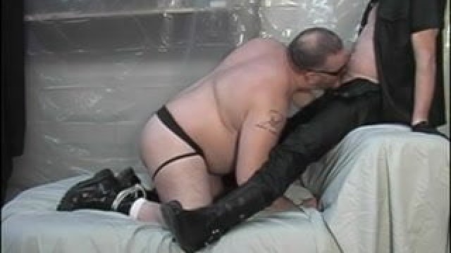 Bound fat man gets cock sucked