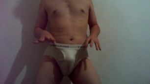 Showing off and teasing in Tommy Hilfiger white briefs