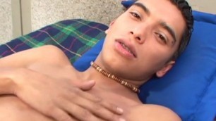 Latino twink with piercings fingers ass while jerking off