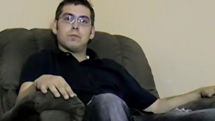 Nerdy amateur with glasses strips to jerk off until he cums