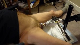 Fuck machine sounding my cock in chastity cage