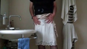 Demurely dressed crossdresser wanking and cumming